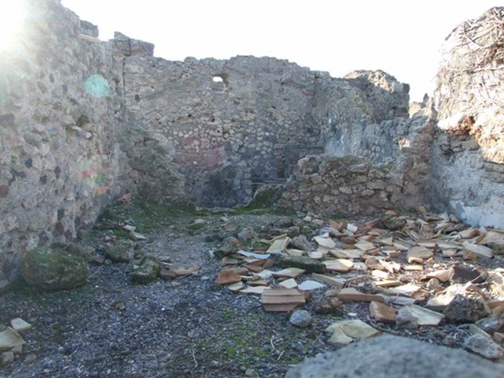 VI.7.11 Pompeii. December 2007. Remains of room in north-west corner, entered through doorway from rear room. Looking west.