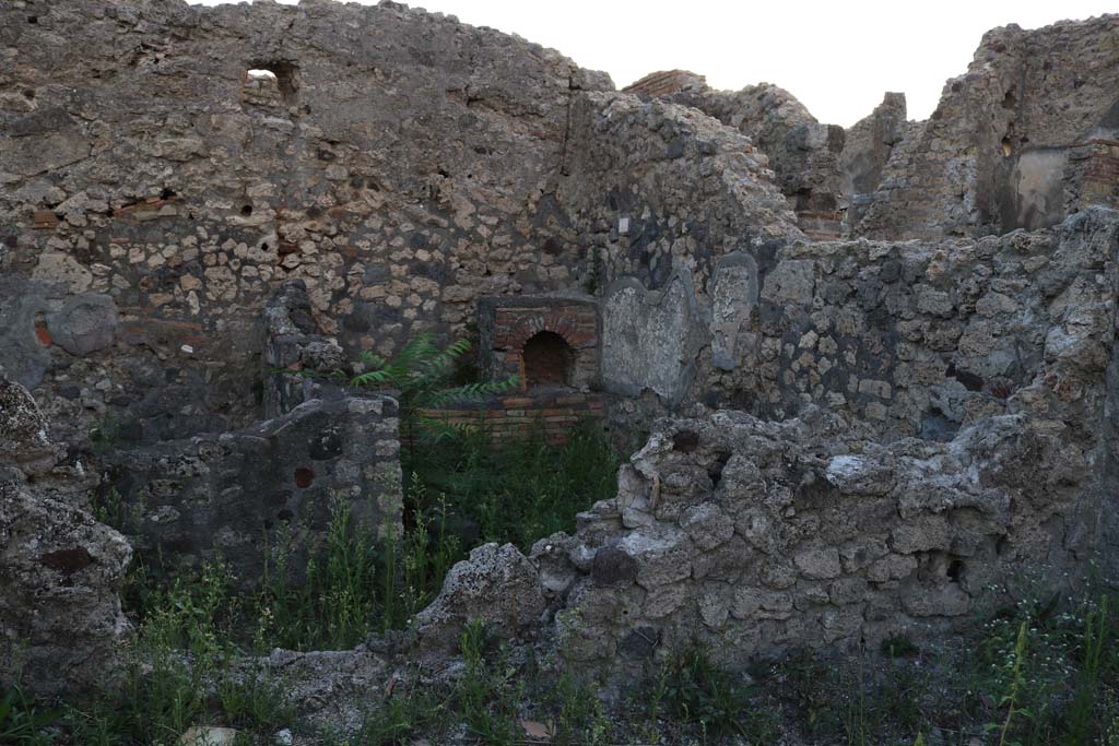 VI.7.7 Pompeii, from VI.7.11. December 2018.
Looking west from room in north-west corner over wall towards kitchen area. Photo courtesy of Aude Durand.