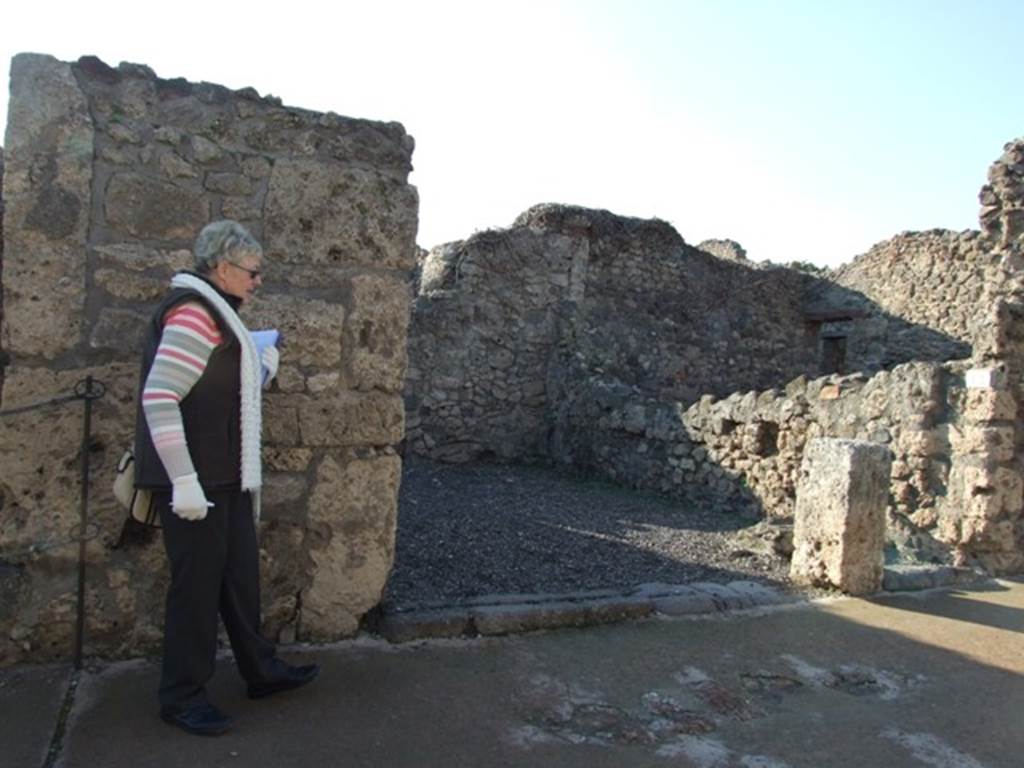 VI.7.13 and VI.7.14 Pompeii. December 2007. Looking west to doorways in Via di Mercurio.
According to Boyce –
“Taberna. On one wall there is a painting of two serpents confronted at an altar furnished with offerings”.
He quotes references – Sogliano, 50; Fiorelli, Descrizione, 110; Niccolini, ii, Desc. Gen., 31.
See Boyce G. K., 1937. Corpus of the Lararia of Pompeii. Rome: MAAR 14, (p.48, no.164).
See Sogliano, A., 1879. Le pitture murali campane scoverte negli anni 1867-79. Napoli: (p.17, no.50, “nearly destroyed”)
According to Fiorelli - on one of the walls of this shop there was a painted lararium.
Nothing appears to remain now.
Fiorelli reported that only the serpents at the sides of the altar remained.
See Pappalardo, U., 2001. La Descrizione di Pompei per Giuseppe Fiorelli (1875). Napoli: Massa Editore. (p.58)