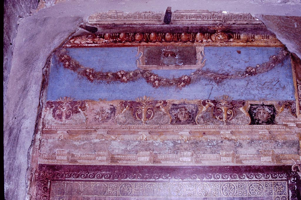 VI.7.18 Pompeii. 1966. East wall of second oecus to south of peristyle.
Decoration from the top left-hand corner near the window. Photo by Stanley A. Jashemski.
Source: The Wilhelmina and Stanley A. Jashemski archive in the University of Maryland Library, Special Collections (See collection page) and made available under the Creative Commons Attribution-Non Commercial License v.4. See Licence and use details.
J66f0699