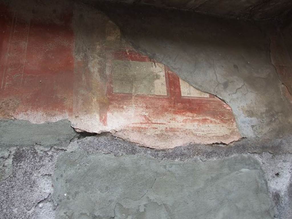 VI.7.19 Pompeii. December 2006. Detail of remains of painted south wall in tablinum.