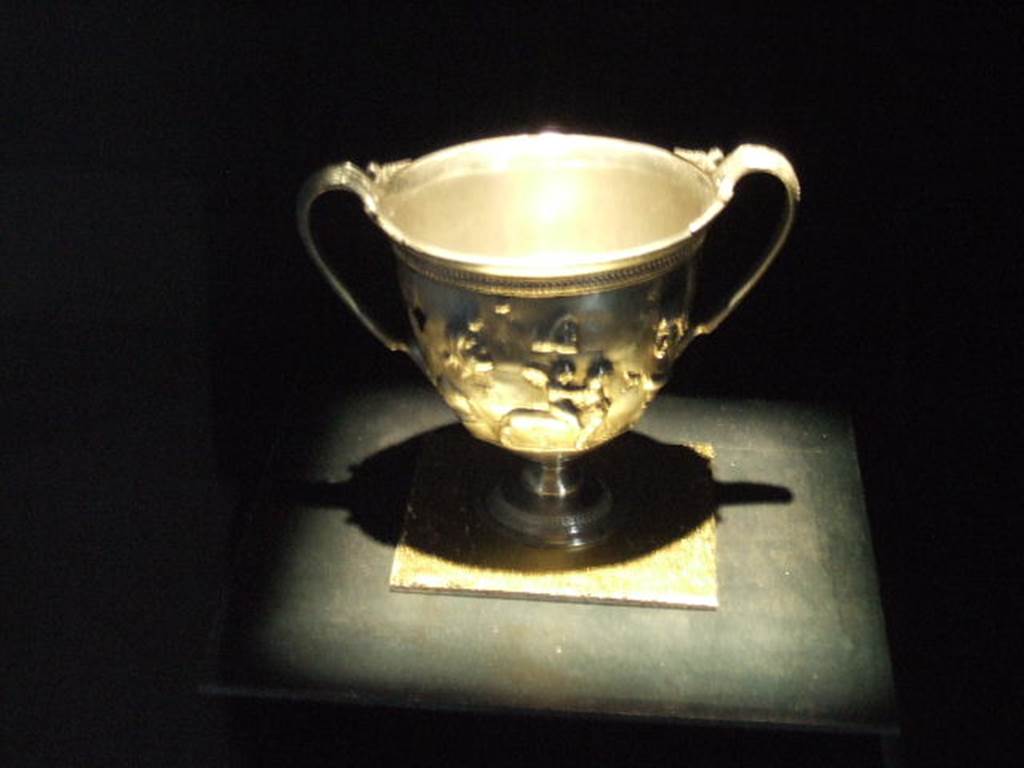 Silver cantharus with cupids on beasts found at VI.7.19. Now in Naples Archaeological Museum. Inventory number 23380. See Guzzo, P. (A cura di), 2006. Argenti a Pompei. Milano, Electa. (p. 168-179).