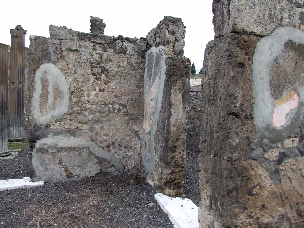 VI.7.20 Pompeii. December 2006. North-east corner of atrium, with doorway to room on north side of entrance corridor, on right.