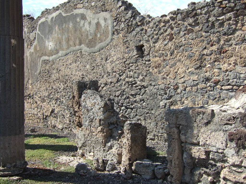 VI.7.21 Pompeii. North side of entrance vestibule with small doorway under site of stairs to upper floor.