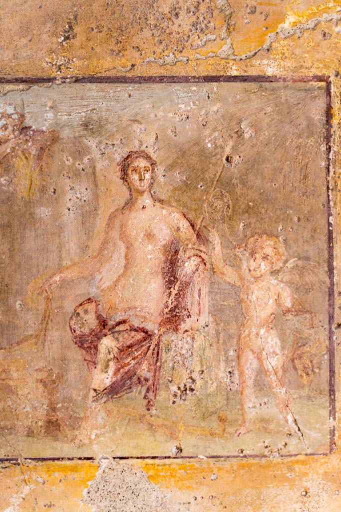 VI.7.23 Pompeii. July 2021.
Detail from central painting on south wall of tablinum. Photo courtesy of Johannes Eber.