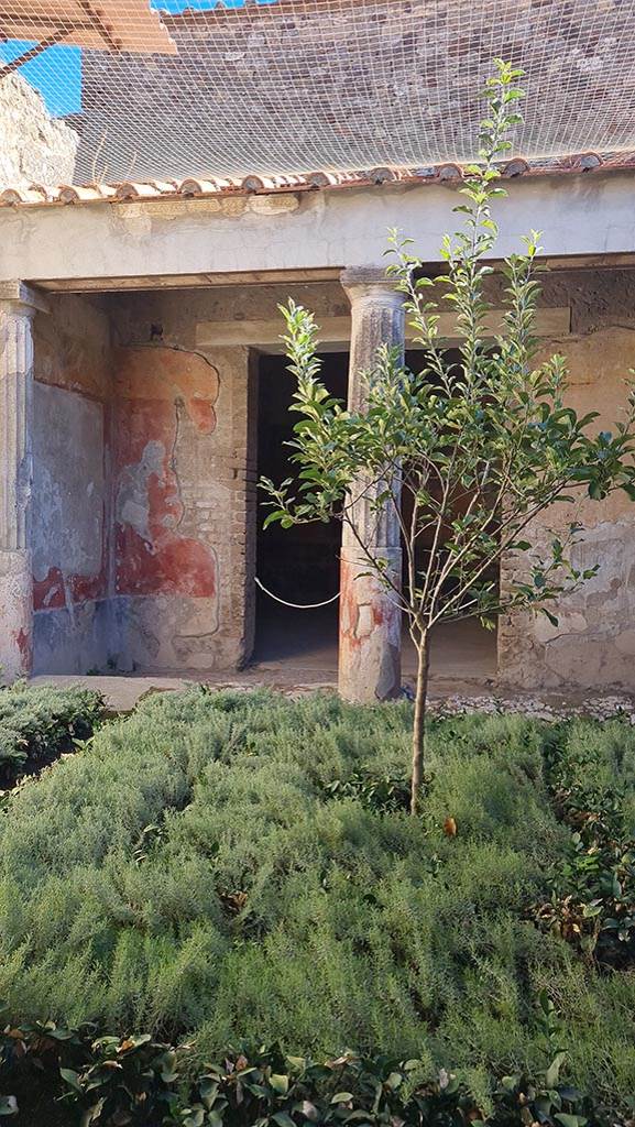 VI.8.3 Pompeii. October 2024.
Looking east across peristyle towards doorway to room 12.
Photo courtesy of Giuseppe Ciaramella.