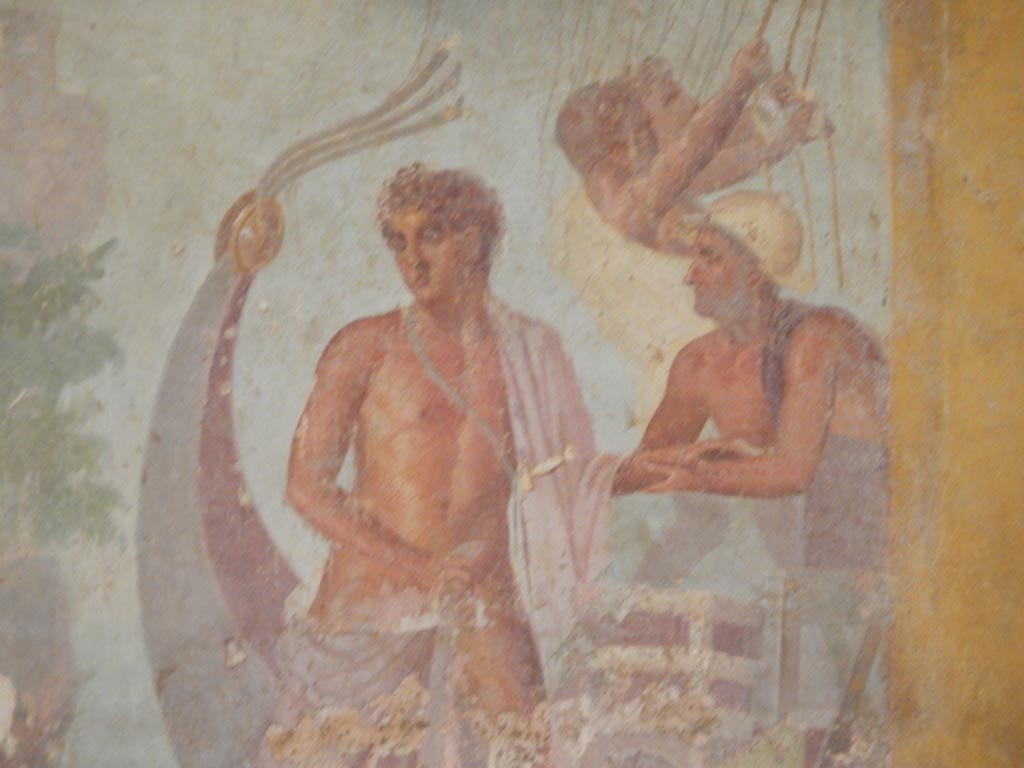 VI.8.3/5 Pompeii. May 2015.
Room 12, detail from central painting on east wall of Theseus going on board ship. Photo courtesy of Buzz Ferebee.