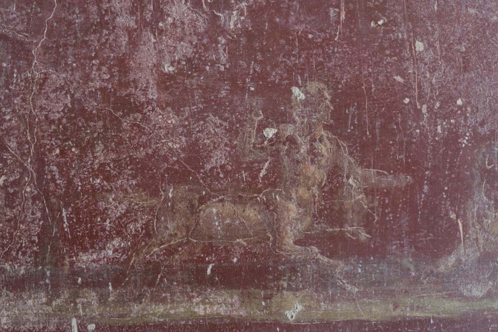 VI.8.3/5 Pompeii. April 2022.
Room 12, detail of part of hunt scene with centaurs and a lion, from red predella below central panel on south wall.
Photo courtesy of Johannes Eber.