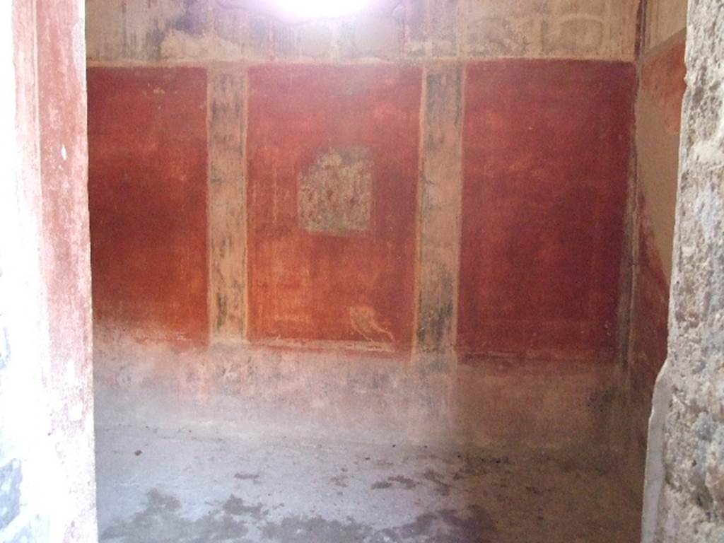 VI.8.3 Pompeii. December 2006. Doorway to room 15, looking towards west wall with square window. The dado was black with painted plants in separated panels. The middle zone was red separated by black bands. In the middle of the central zone was a painting of Narcissus, now faded and unrecognisable. The upper area was white with architectural designs, and a stucco cornice.
See Bragantini, de Vos, Badoni, 1983. Pitture e Pavimenti di Pompei, Parte 2. Rome: ICCD. (p.173)
See Helbig, W., 1868. Wandgemälde der vom Vesuv verschütteten Städte Campaniens. Leipzig: Breitkopf und Härtel. (1352)
According to Breton, when excavated, the painting of Narcissus was already faded and ruined.
See Breton, Ernest. 1870. Pompeia, Guide de visite a Pompei, 3rd ed. Paris, Guerin.