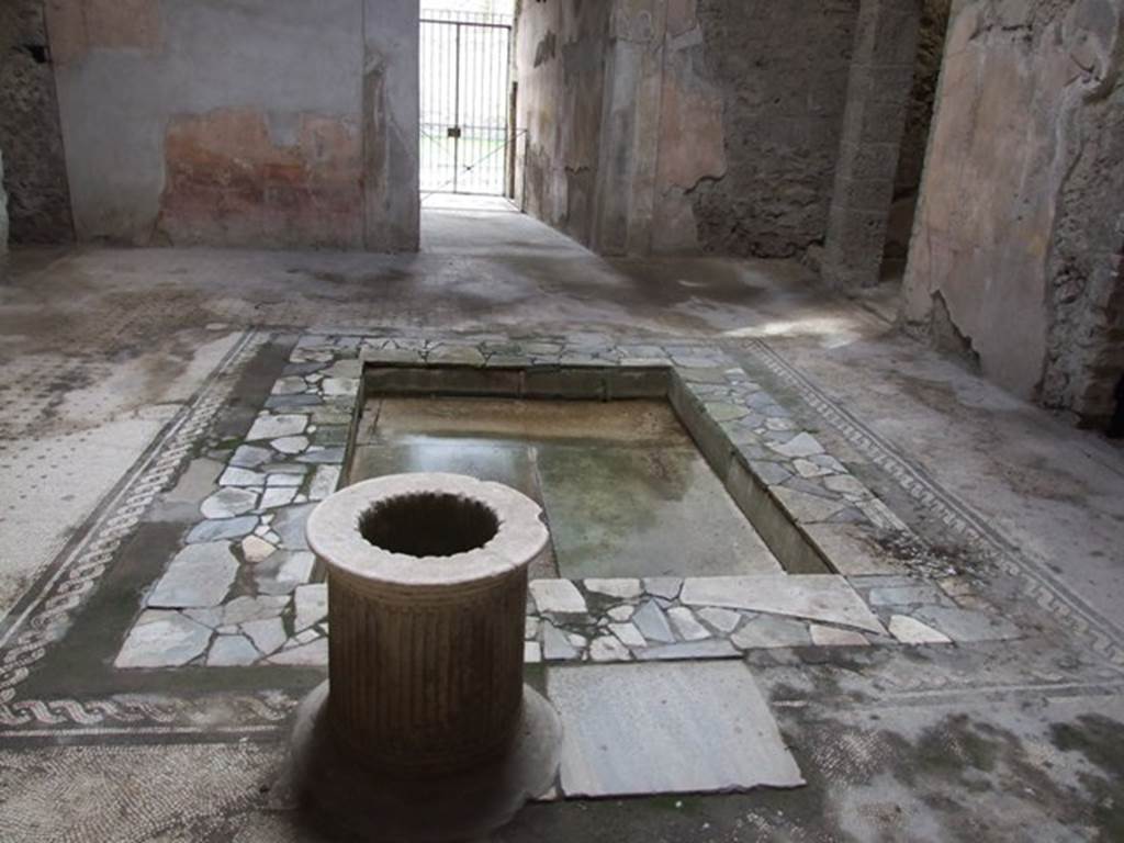 VI.8.5 Pompeii. March 2009. Room 1, looking south across impluvium and puteal in atrium.