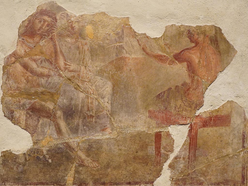 VI.8.5 Pompeii. Tablinum east wall. PPM shows this picture of Alcestis and Admetus. 
According to PPM, Alcestis and Admetus appear seated while the oracle refers to the imminent death of Admetus; the parents of the young bride and a girl attend the scene, on the right the bust of Apollo.
Now in Naples Archaeological Museum. Inventory number 9025.
See Carratelli, G. P., 1990-2003. Pompei: Pitture e Mosaici: Vol. IV. Roma: Istituto della enciclopedia italiana, p. 546-7, n. 36.
According to Bragantini, in PPM, p. 547, the picture inv. 9025 is wrongly attributed to the House of the Tragic Poet and also by Schefold to the Masseria di Irace and she is not aware of its origin.
See Bragantini I., 2001. Quadri con la rappresentazione della storia di Admeto e Alcesti: MEFR. Antiquité, tome 113, n°2. 2001. Antiquité. p. 813 e nota 45.
Our thanks to Rachel Lowder for helping with this.
