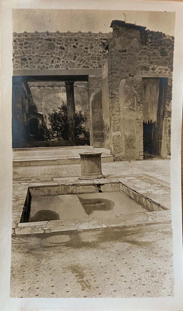 VI.8.5, Pompeii. 1907.
Looking north across atrium flooring and impluvium towards tablinum and doorway to corridor, leading to rear.
Photo courtesy of Rick Bauer.