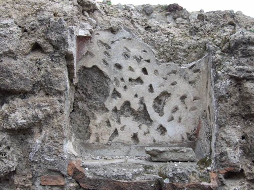 VI.8.8 Pompeii. December 2007. Niche on east wall of rear room.
According to Boyce, the inside walls were decorated with red lines and spots on a white background, its floor projected like a narrow shelf. Fiorelli called it “la nicchia dei Penati”. See Boyce G. K., 1937. Corpus of the Lararia of Pompeii. Rome: MAAR 14. p49 ( no.169)