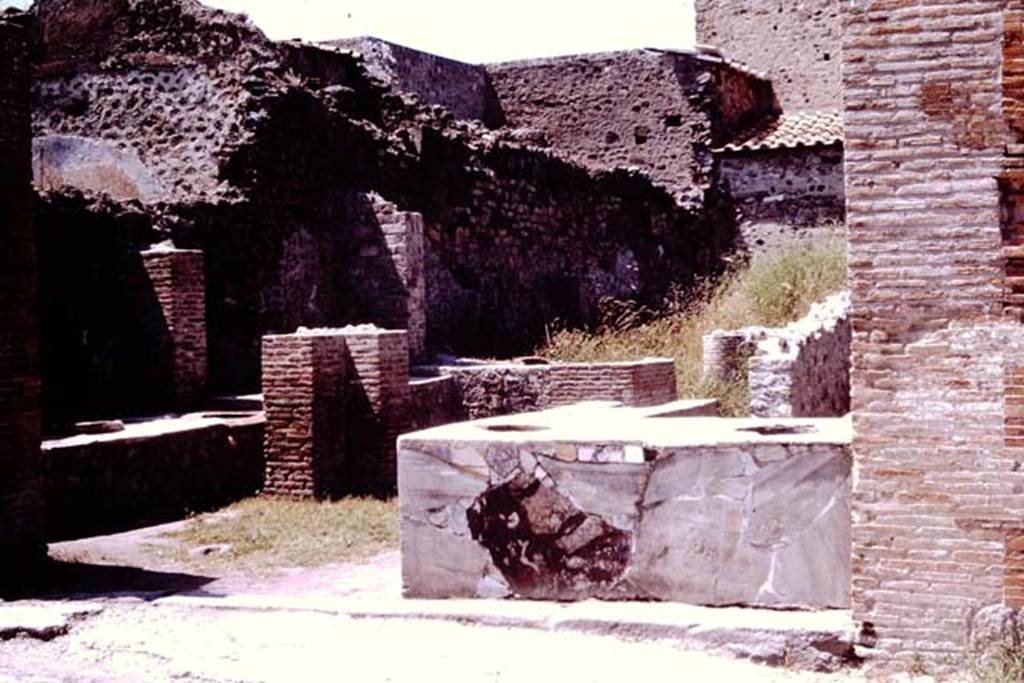 VI.8.8 Pompeii. 1964. Looking north-west towards entrance in bar-room. Photo by Stanley A. Jashemski.
Source: The Wilhelmina and Stanley A. Jashemski archive in the University of Maryland Library, Special Collections (See collection page) and made available under the Creative Commons Attribution-Non Commercial License v.4. See Licence and use details.
J64f1518
