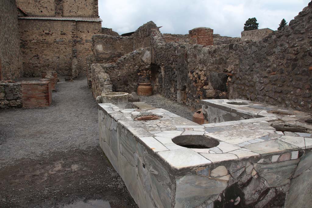 VI.8.8 Pompeii. April 2014. Looking north across marble counter to rear. Photo courtesy of Klaus Heese.