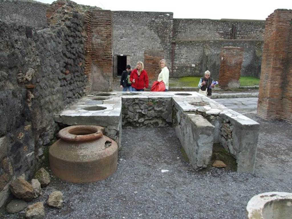 VI.8.8 Pompeii. March 2009. Rear of marble counter.