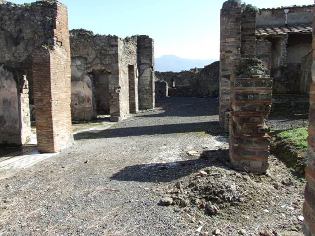 VI.8.20 Pompeii. March 2009. Room 4, looking south across east side of peristyle area.
According to Jashemski, the peristyle garden (excavated in 1825-26) had a portico on all four sides.
This was supported by eleven thick brick pillars which had replaced earlier columns.
The pillar in the middle of the east side is not shown on the Eschebach plan.
Between the two pillars at the south end of the east side of the portico there was a fountain.
On three sides of the corner (left) pillar was a remarkable series of four paintings which pictured in detail the various processes in the fulling industry.
See Jashemski, W. F., 1993. The Gardens of Pompeii, Volume II: Appendices. New York: Caratzas. (p.134, figs 145,6,7,8)