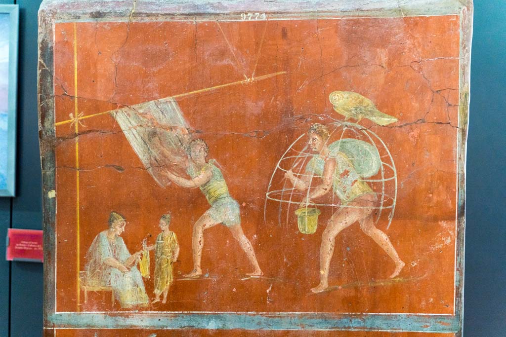 VI.8.20 Pompeii. July 2021. Detail from the pillar found in the Fullonica.
Painting showing the inspection of the cloth, brushing the cloth to raise the nap and a bleaching frame. Photo courtesy of Johannes Eber.
Now in Naples Archaeological Museum. Inventory number 9974.
