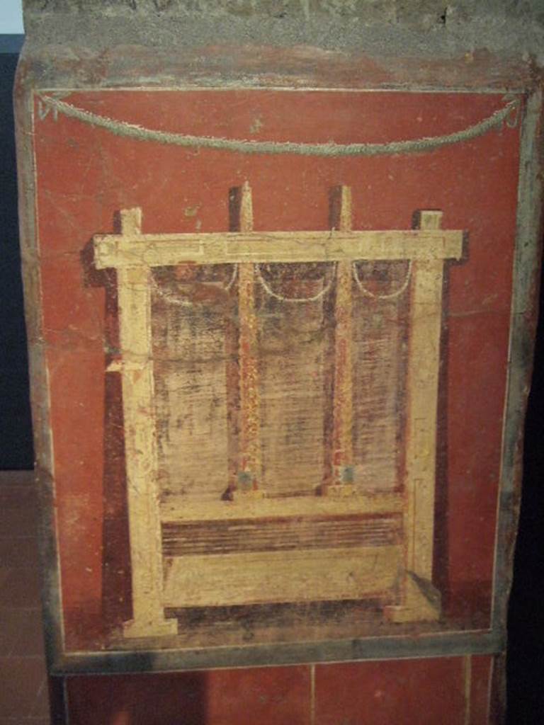 Pillar found in the Fullonica at VI.8.20. Painting of fuller’s press for drying the wet cloths. Now in Naples Archaeological Museum. Inventory number 9974.