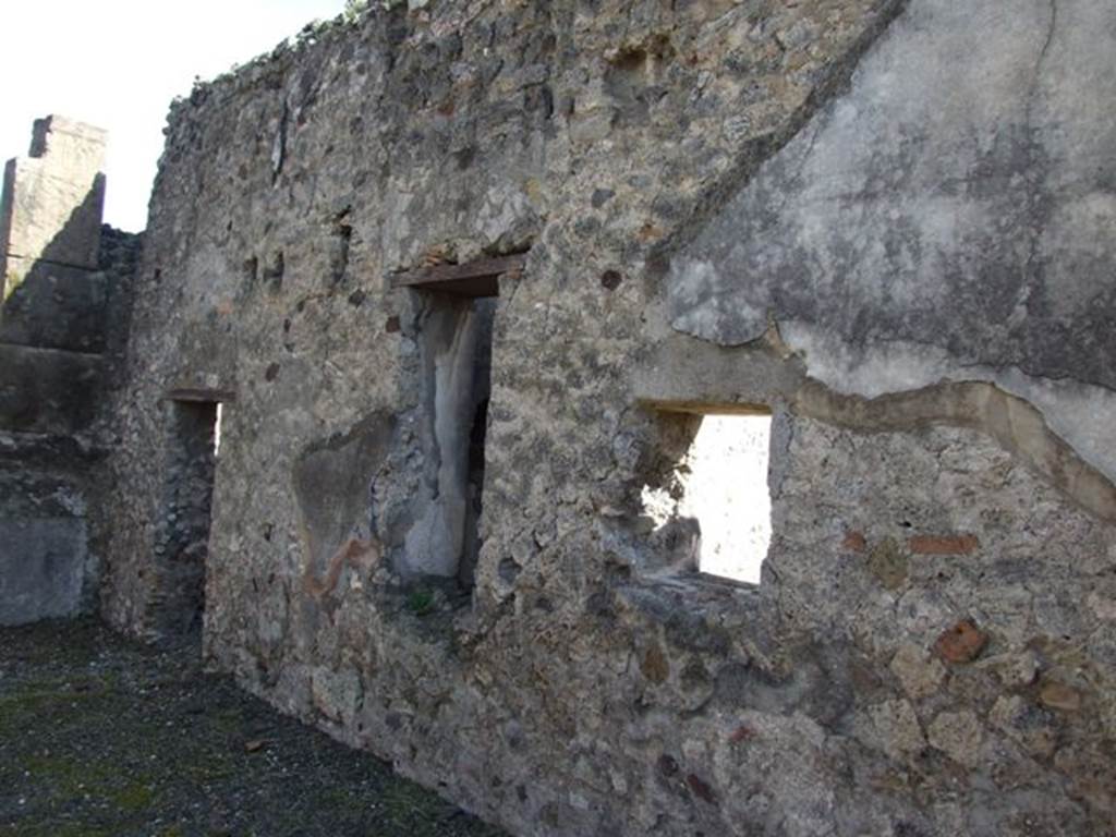 VI.8.20 Pompeii. March 2009. Room 1, looking east along south wall of entrance corridor.  