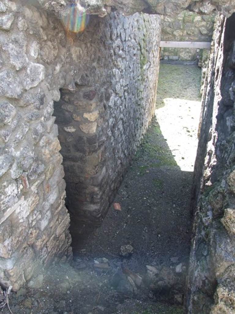 VI.8.22 Pompeii. March 2009. Looking west to lower level and door of Room 7.
