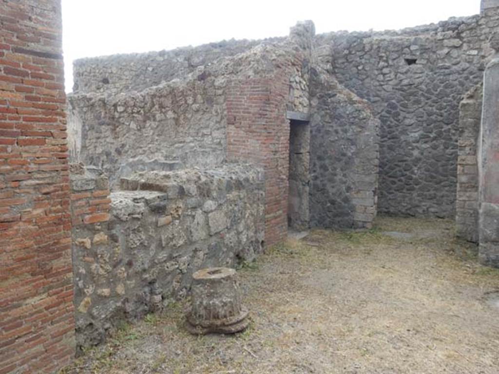 VI.8.22 Pompeii. May 2017. Room 6, portico area at south end of garden, and doorway to small room under stairs on left. Photo courtesy of Buzz Ferebee.