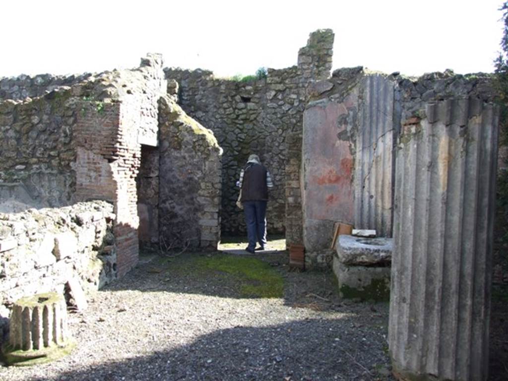 VI.8.22 Pompeii. March 2009. Room 6. Portico area at south end of garden, and door to small room under stairs on left.