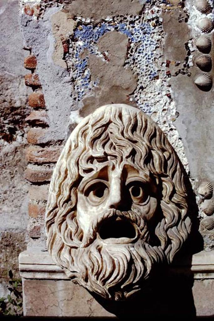 VI.8.22 Pompeii. 1968. Detailed view of mask on left (or south) of the large fountain. Photo by Stanley A. Jashemski.
Source: The Wilhelmina and Stanley A. Jashemski archive in the University of Maryland Library, Special Collections (See collection page) and made available under the Creative Commons Attribution-Non Commercial License v.4. See Licence and use details.
J68f1253