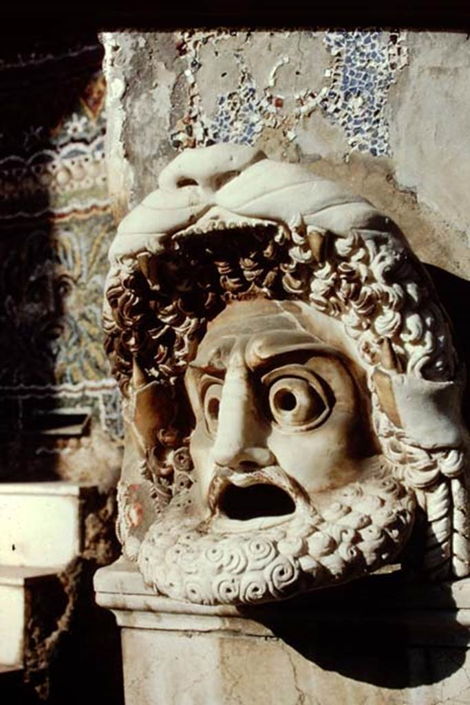 VI.8.22 Pompeii. 1968. Hollow marble mask of bearded male figure on north side of fountain.
Photo by Stanley A. Jashemski.
Source: The Wilhelmina and Stanley A. Jashemski archive in the University of Maryland Library, Special Collections (See collection page) and made available under the Creative Commons Attribution-Non Commercial License v.4. See Licence and use details.
J68f1246