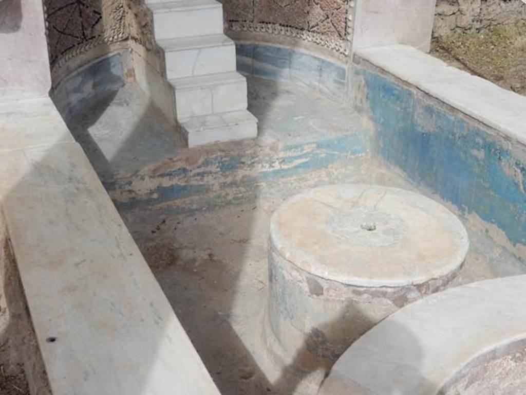 VI.8.22 Pompeii. May 2017. Looking towards the west end of pool of large fountain.
The remains of blue paint can be seen on the walls. Photo courtesy of Buzz Ferebee.