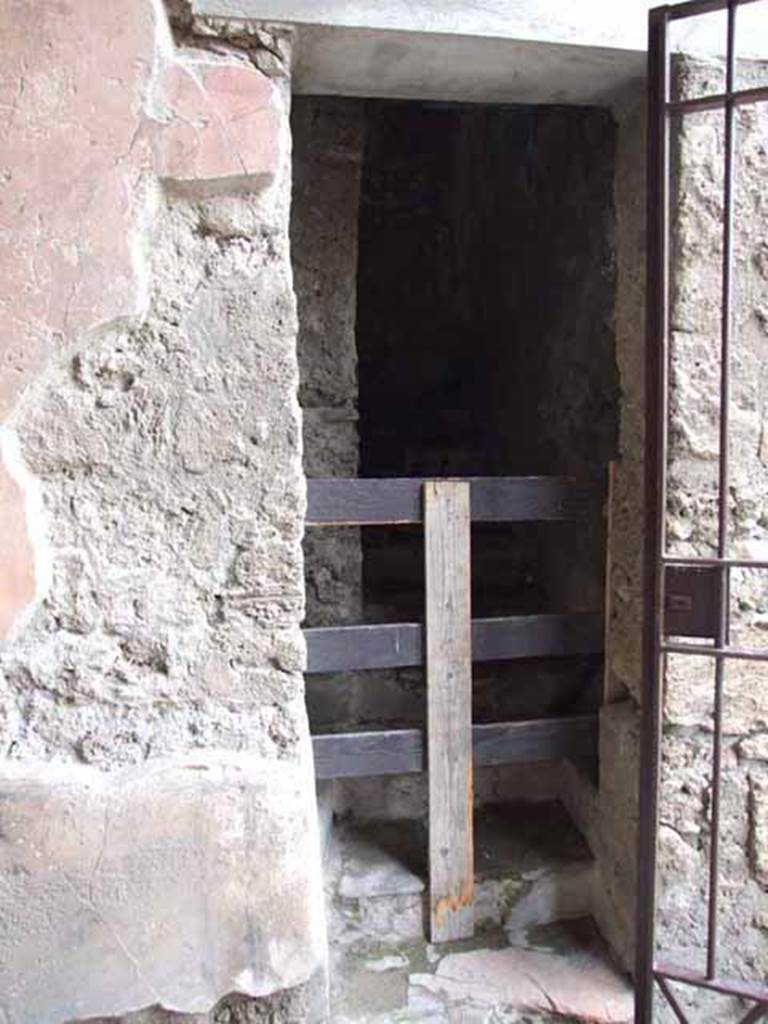 VI.8.23 Pompeii. May 2010. Steps to upper floor on the north side of entrance.  