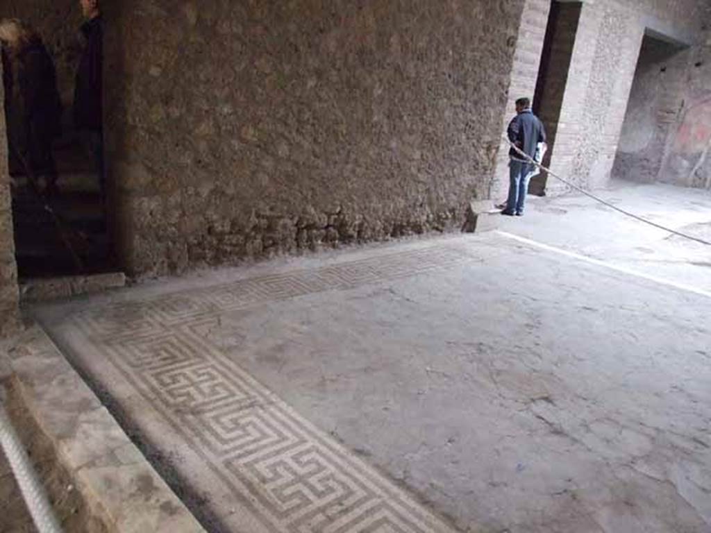 VI.8.23 Pompeii. May 2010. North wall of tablinum, and mosaic floor, looking east.