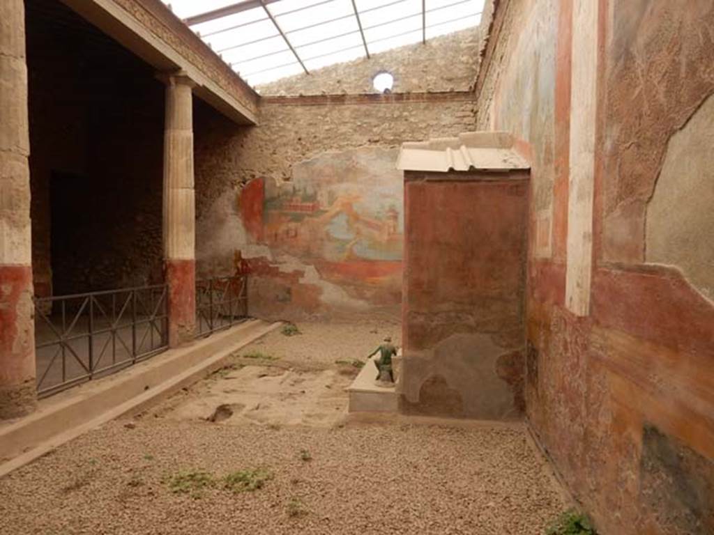 VI.8.23 Pompeii. May 2017. Looking south along the west wall behind the fountain.
Photo courtesy of Buzz Ferebee.