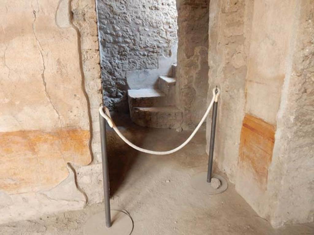 VI.8.23 Pompeii. May 2017. Looking north through doorway at east end of north wall towards stairs in VI.8.24. Photo courtesy of Buzz Ferebee.