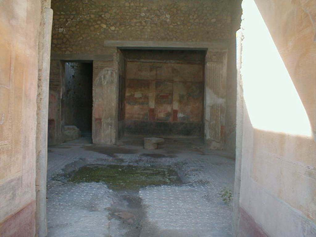 VI.8.24 Pompeii. September 2004. Looking west from entrance, across atrium towards tablinum