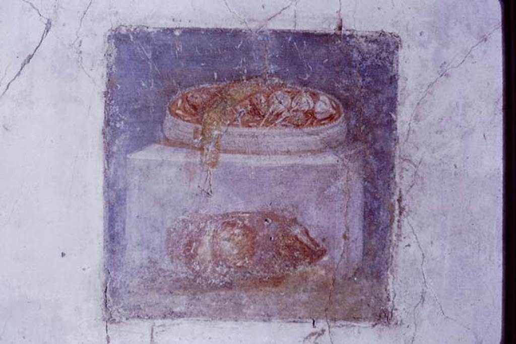 VI.8.24 Pompeii, 1968. Triclinium in south-east corner of atrium. Central painting from north wall showing a pig leaning against a base with a basket of onions and sausage above. Photo by Stanley A. Jashemski.
Source: The Wilhelmina and Stanley A. Jashemski archive in the University of Maryland Library, Special Collections (See collection page) and made available under the Creative Commons Attribution-Non Commercial License v.4. See Licence and use details. J68f0730