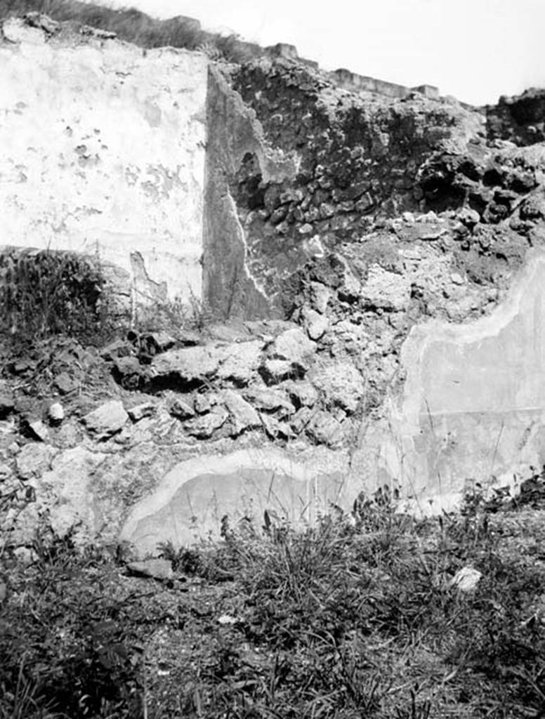 230855 Bestand-D-DAI-ROM-W.654.jpg
6.9.1 Pompeii. W654.
Looking north-east towards rear north wall of room 8, which contained a small private room (9) and small garden. The photo would have been taken from the area of either cubiculum 7, or room 10, showing the remains of the painted decoration on the lower wall.
Photo by Tatiana Warscher. With kind permission of DAI Rome, whose copyright it remains.
See http://arachne.uni-koeln.de/item/marbilderbestand/230855