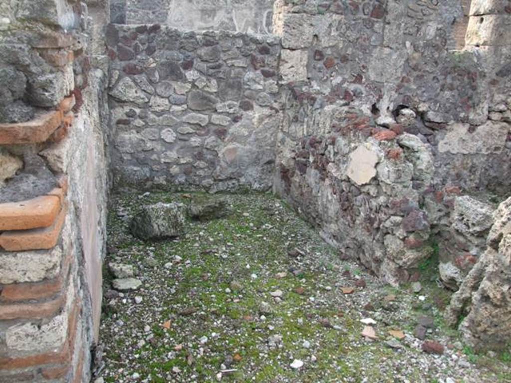 VI.9.1 Pompeii. December 2007. Room 20, looking west. According to Packer, in number 20 (or 7on his plan) the walls would have been decorated with yellow panels separated by red borders. Originally this would have been the entrance corridor of a previously separate house, which was then converted into bedroom use.
See Cronache Pompeiane, IV, 1978, for article by Packer, J: Inns at Pompeii: a short survey (p.26)
According to Warscher, "the room "i”, open in its entire width to the triclinium "O” was rebuilt from the fauces of a second house, already mentioned. Here also you will find traces of very coarse painting – perhaps if I am not mistaken – griffins are represented here”.
See Warscher, T, 1938: Codex Topographicus Pompejanus, Regio VI, insula 9: Pars prima, DAIR, Rome.