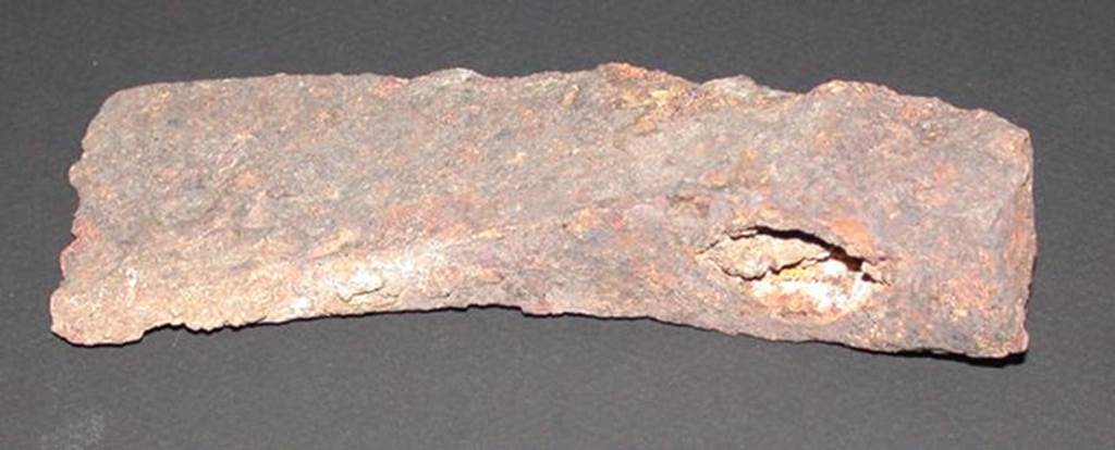 VI.9.1 Iron axe head, rear view. Height 0.033m, width 0.057m, length 0.14m.
OA 2811 Hache, musée Condé, photo RMN © R.G. Ojeda