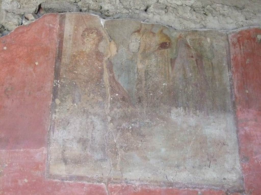 VI.9.2 Pompeii. December 2007. Room 27. West wall. Fresco of Paris preparing himself? Fresco of Hector and Paris? Helbig identifies in the 4th room behind peristyle: Paris preparing himself, 1313. See Helbig, W., 1868. Wandgemälde der vom Vesuv verschütteten Städte Campaniens. Leipzig: Breitkopf und Härtel. (1313). Schefold suggests this may be Hector and Paris. See Schefold, K., 1962. Vergessenes Pompeji. Bern: Francke. (T. 170,1).