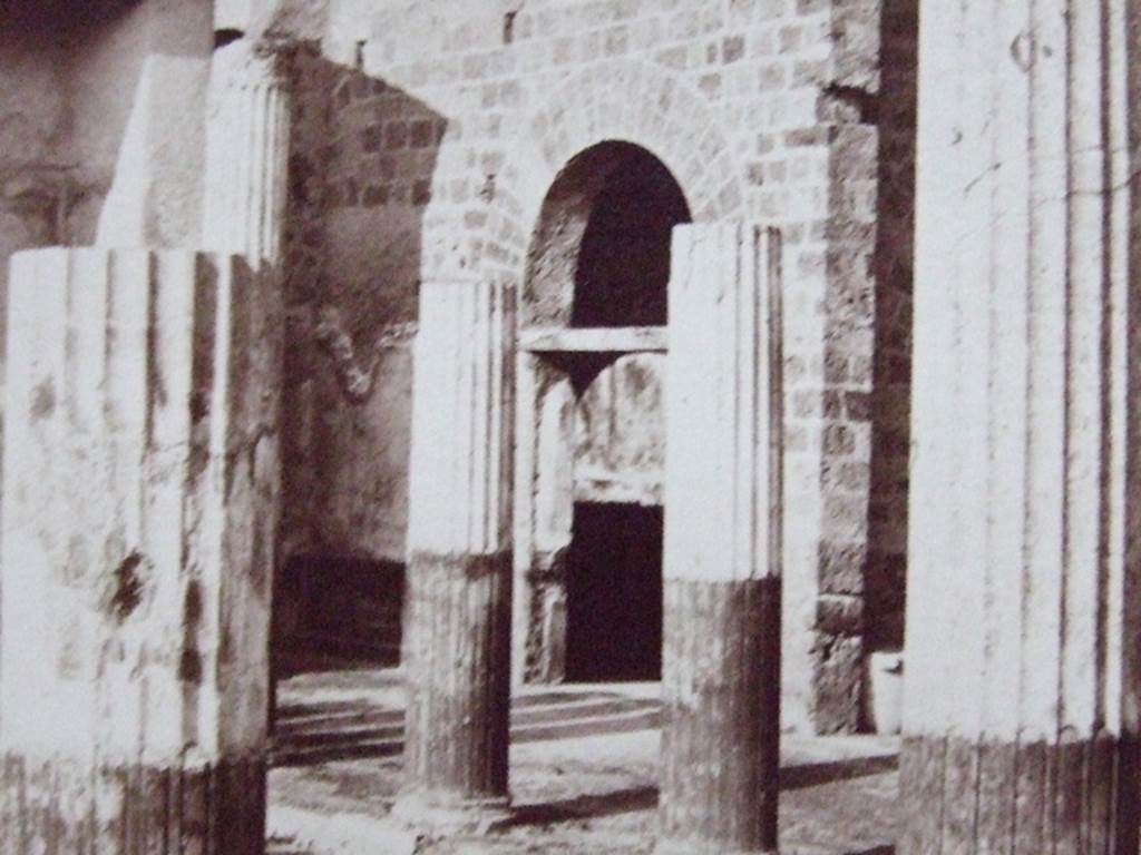 VI.9.2 Pompeii. Looking towards north-east corner of peristyle 16. The doorway to room 27 is in the centre, and the wall to the east of room 28, between the first and second columns, on left. Old undated photograph, Courtesy of Society of Antiquaries. Fox Collection.