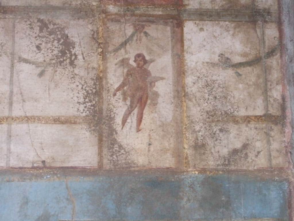 VI.9.2 Pompeii. September 2005. Room 29, painted figure from upper wall at west end of south wall.