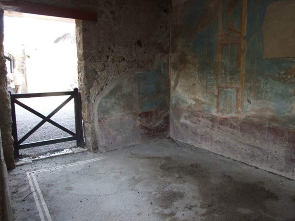 VI.9.2 Pompeii. December 2007. Room 29. East wall with door to atrium, painted wall and mosaic floor.