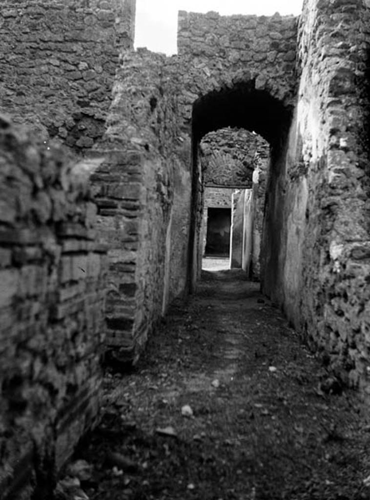 231002 Bestand-D-DAI-ROM-W.498.jpg
VI.9.2 Pompeii. W.498. Room 32, looking west along corridor from services area towards atrium.
Photo by Tatiana Warscher. With kind permission of DAI Rome, whose copyright it remains.
See http://arachne.uni-koeln.de/item/marbilderbestand/231002