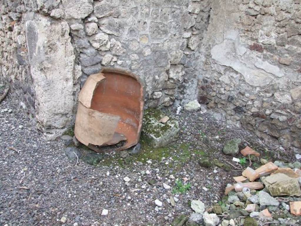 VI.9.2 Pompeii. December 2007. Room 38. Kitchen. Remains of Dolium over cistern mouth.