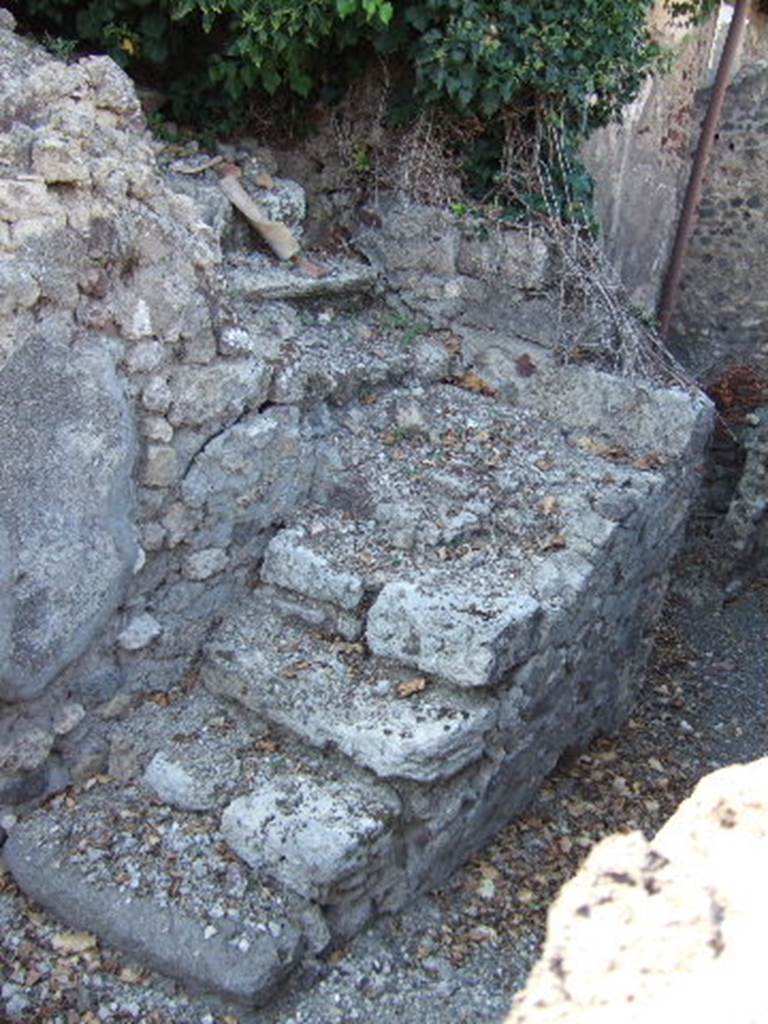VI.9.2 Pompeii. September 2004. Room 30, remains of stone staircase 39 with room 40 behind.