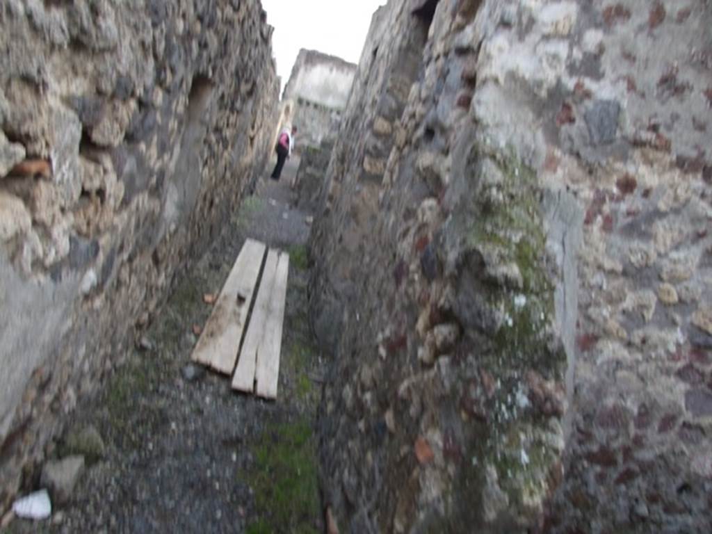 VI.9.2 Pompeii. December 2007. Room 30. Corridor on east side of the house, looking south.