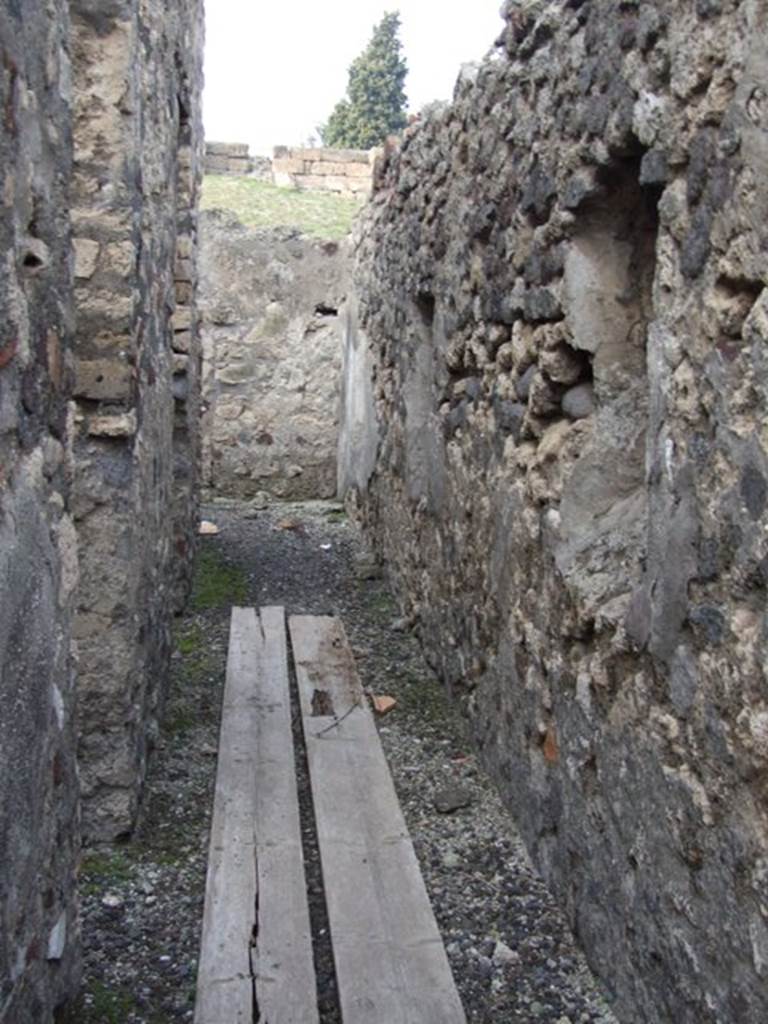 VI.9.2 Pompeii. December 2007. Room 30. Corridor on east side of the house, looking north.