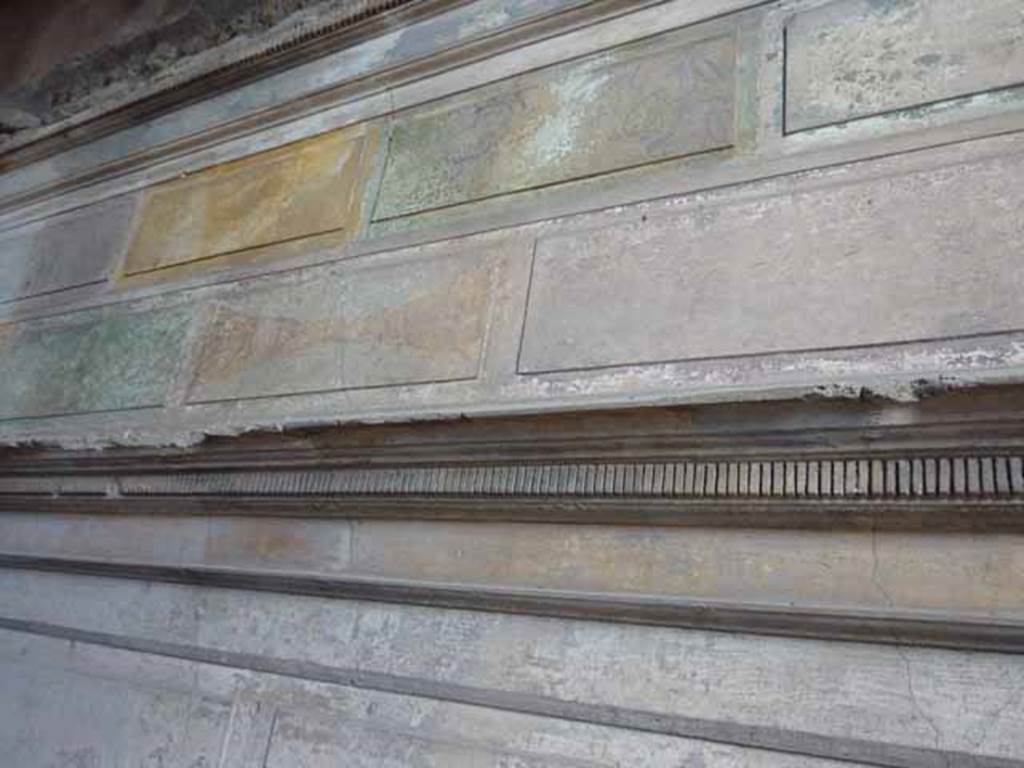 VI.9.3 Pompeii. October 2010. North wall of cubiculum 3, on south side of entrance doorway decorated in the first style. Photo courtesy of Gabriele Große.