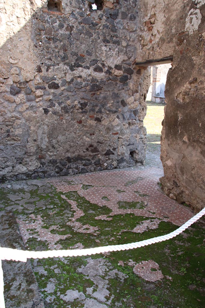 VI.9.4 Pompeii. October 2022.
Room 15, looking towards south-east corner, and doorway in south wall into fauces 14 and atrium 16 of VI.9.5.
Photo courtesy of Klaus Heese.